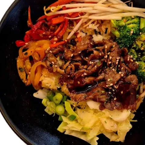 Beef bulgogi and vegetables over rice