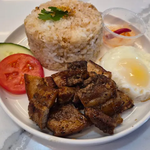 Grilled pork belly with garlic fried rice and egg